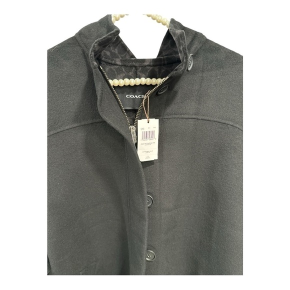 Coach Double Face Wool Cape
Comparable Value
$798 size XS-S oversized NWT - Picture 7 of 8